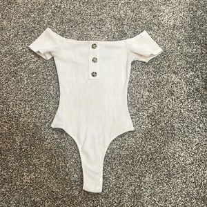 A cute button up bodysuit